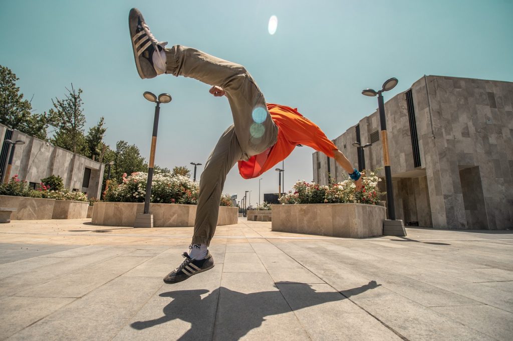 person doing parkour in an urban area